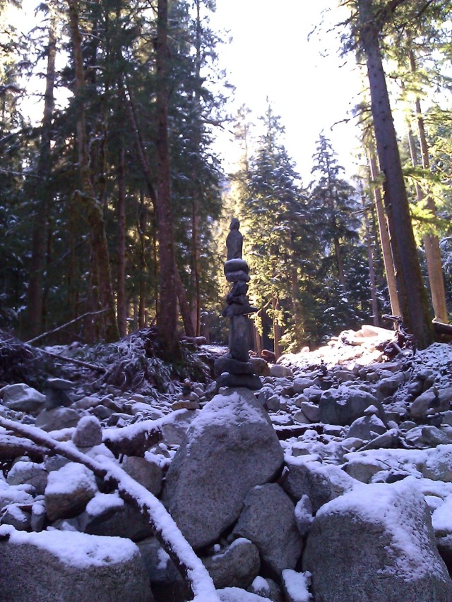 Rock cairn in wintry Middle Fork Snoqualmie forest.