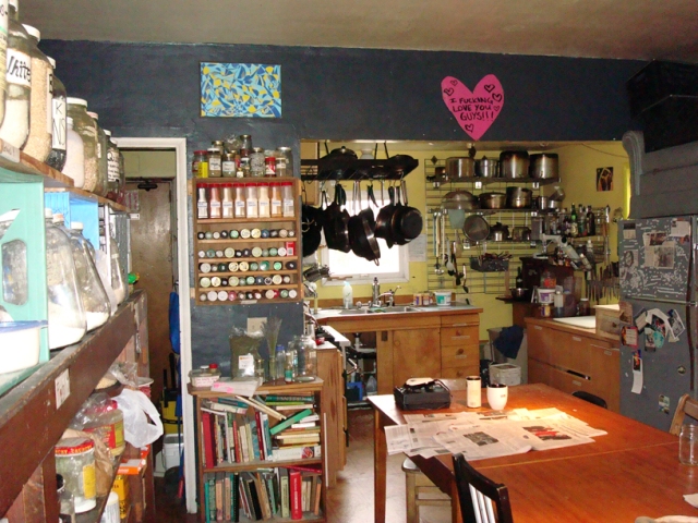 The kitchen, the heart of Sherwood, circa 2009.  Note couch on top of fridges.